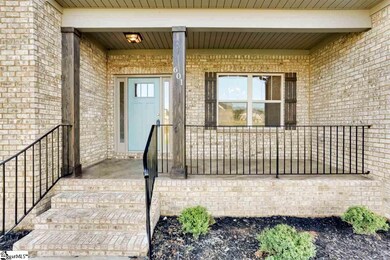 With stamped and stained concrete accent