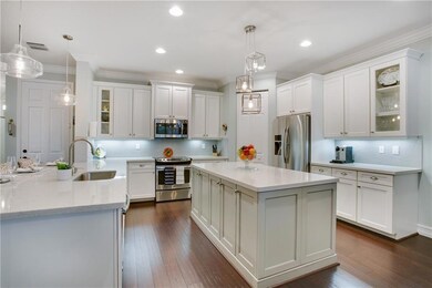 Chef's kitchen open to family and dining room.