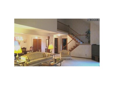 View of Great Room looking toward staircase leading to 2nd level