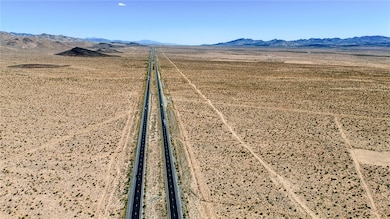 Aerial view of sparsely populated area with mounta