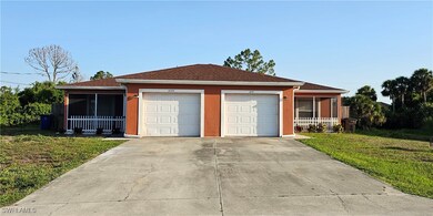 Single story home with a garage, driveway, a front