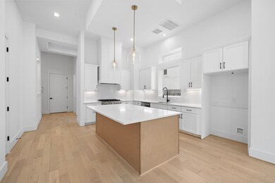 Alternate view of spacious island with beautiful q