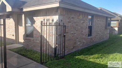 View of property exterior featuring a yard