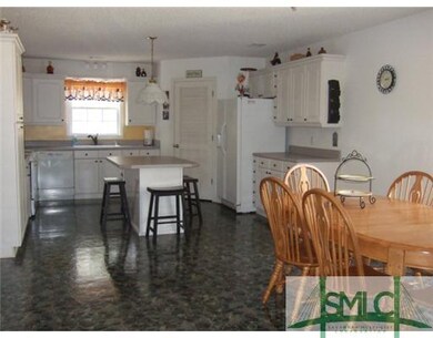 Kitchen. Note center island and lots of cabinet sp