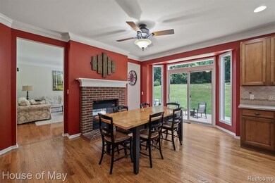 Cozy 2-way kitchen/family room fireplace.