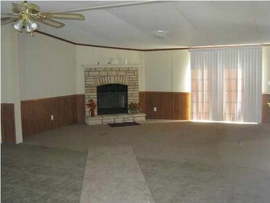 Large family room with corner fireplace