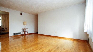 Prisitine hard wood throughout main living areas.