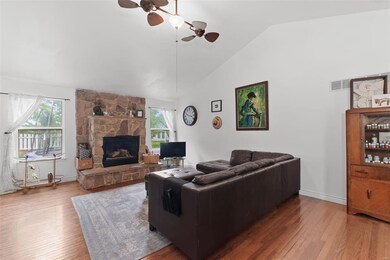 Check out this stunning stone fireplace and vaulte