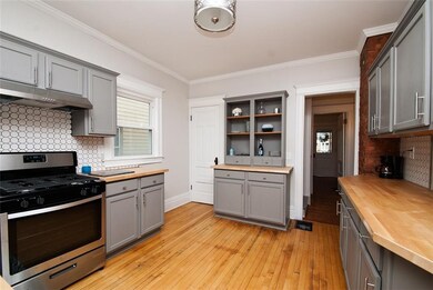 New stainless appliances and a built-in dresser. D