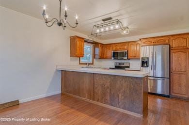 1151 13th St W, Dickinson, ND 58601 - photo 7