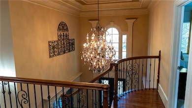 upper landingview of two story lovely foyer