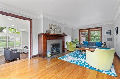 Living room with detailed crown molding.