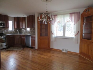 Dining room features corner built-in china closets