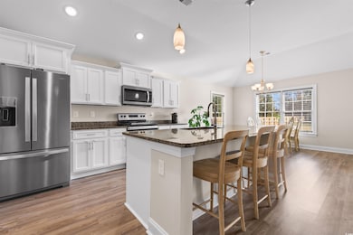 Kitchen featuring stainless steel appliances, a ce