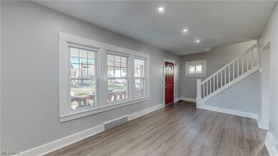 Entrance foyer featuring light hardwood / wood-style flooring