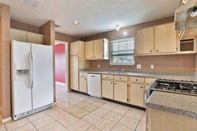 9042 Mcgallion Rd, Houston, TX 77022 - photo 6