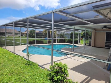 Large covered Patio and pool cage.