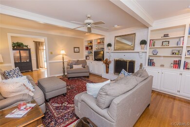 The family room boasts beautiful coffered ceilings