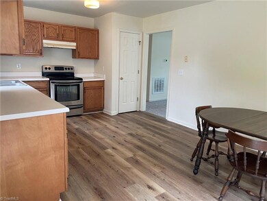 Kitchen leading to living room