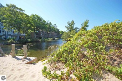 Looking from the bridge and beach towards the rive