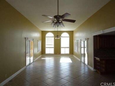 Huge living room with custom trim and moldings.