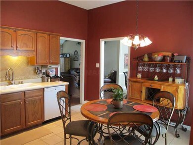 Wonderful eat-in Kitchen with tile floor and back 