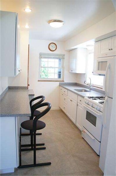 Kitchen w/ Granite Counter Tops, New Cabinets, Dis