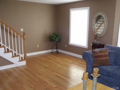 Model Pictured... 1st floor living room with hard 