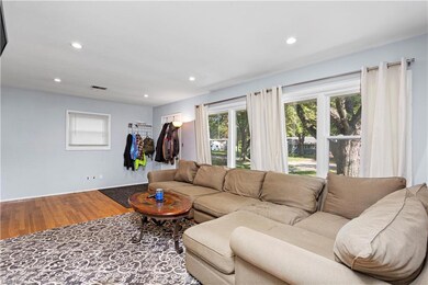 View of hardwood floored living room