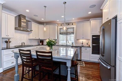 Gorgeous kitchen with a huge island for prep or br