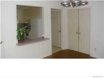 Another view towards the kitchen.  Double doors le