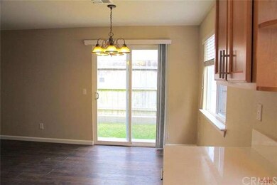 Dining Area off of Living Room and Kitchen looks o