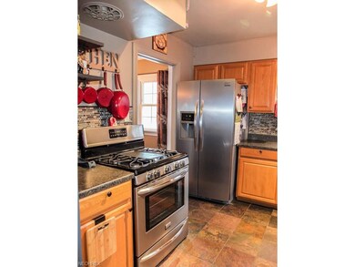Kitchen has stainless steel appliances.