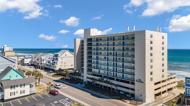 View of building exterior featuring a water view