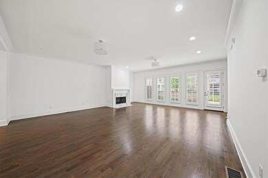 Fireplace, recessed lighting, designer paint.