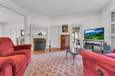 Spacious Living Room Opens to Screened Porch and D