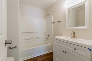 Full bath with vanity, shower / bathtub combinatio