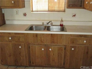 Galley kitchen has eat in area