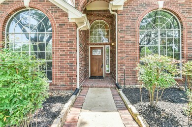 Covered Entrance Greets your Family and Friends. Beautiful Wood Door installed.