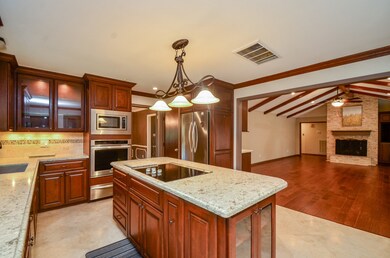 Kitchen features high-end appliances, custom cabin
