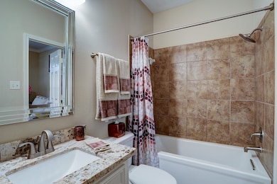 Downstairs bedroom has its own private bathroom.