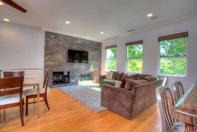 Fireplace feature wall and bamboo floors.