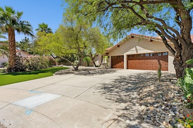 7508 E Aster Dr - Front