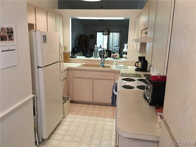 view of kitchen from breakfast nook
