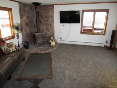 living room #2 with wood burning fire place