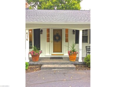 The cheery front door welcomes visitors to the sta