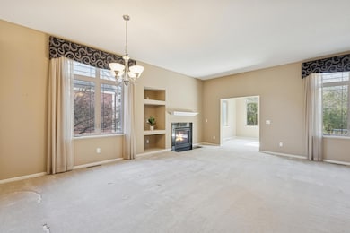 Living room features a cozy gas fireplace