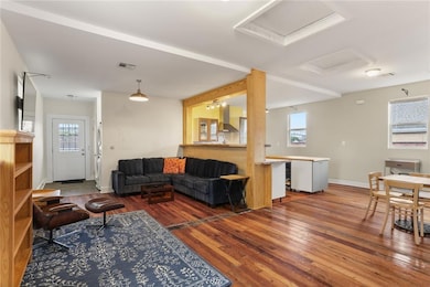 Living room overlooking the kitchen and dining are