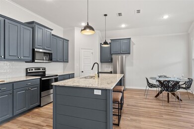 Kitchen with stainless steel appliances