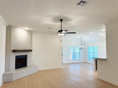 Unfurnished living room featuring light wood-type 